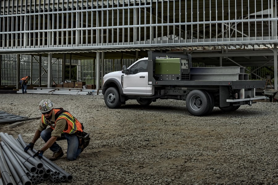 2025 Ford Super Duty® F-550® XL flatbed parked at a job site
