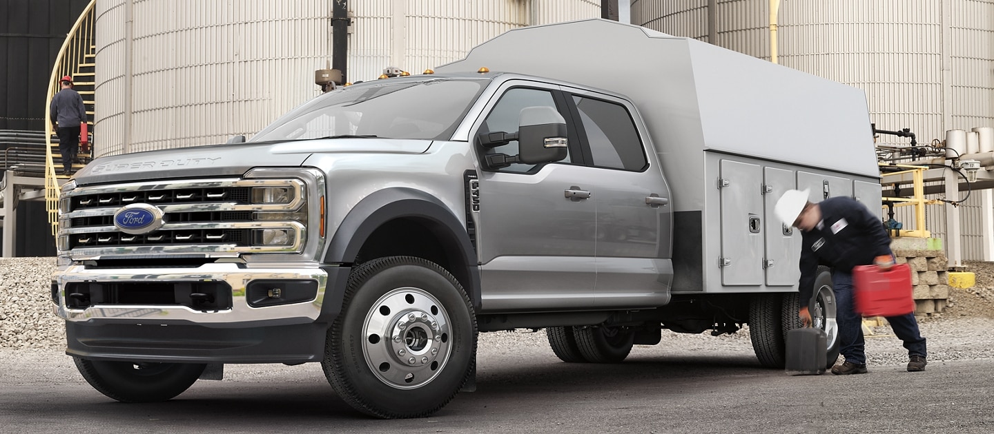 2025 Ford Super Duty® F-450® XL with a utility box parked at a refinery