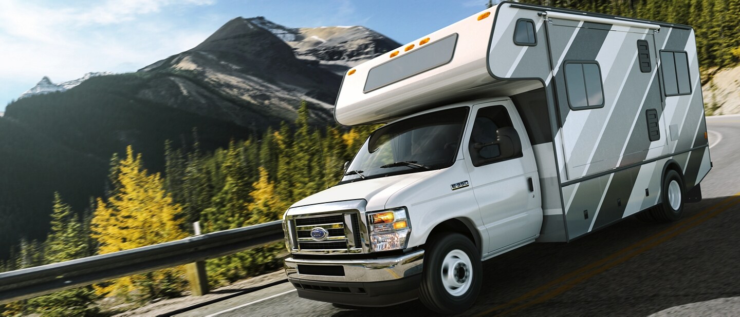2024 Ford E-Series Cutaway being driven on a mountain road