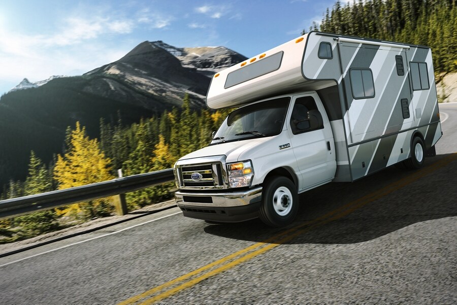 2024 Ford E-Series Cutaway being driven on a mountain road