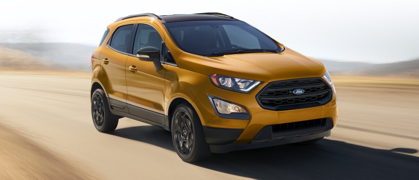 2021 Ford EcoSport in Lux Yellow being driven rapidly on a curving road