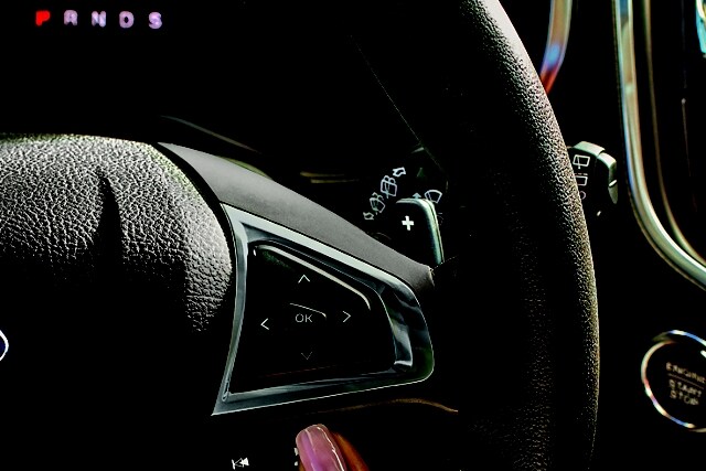 Close-up of paddle shifters of a 2023 Ford Edge® SUV