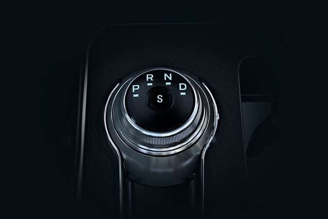 Close-up of the rotary gear shift dial in a 2023 Ford Edge® SUV