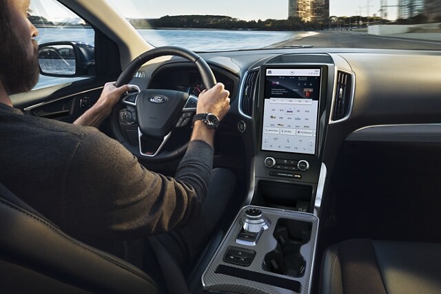 Interior of 2023 Ford Edge® SUV console with SYNC® 4A touchscreen