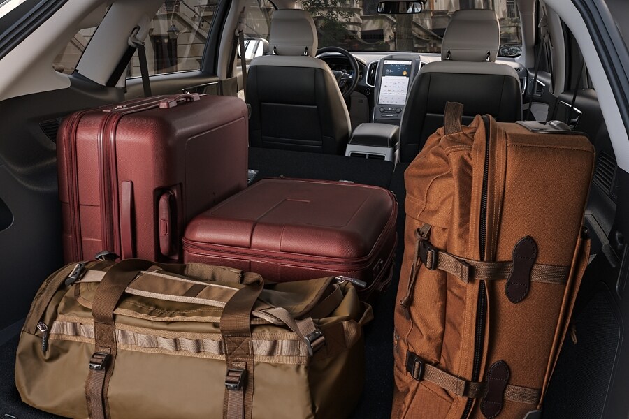 Close-up of lots of luggage with the liftgate open