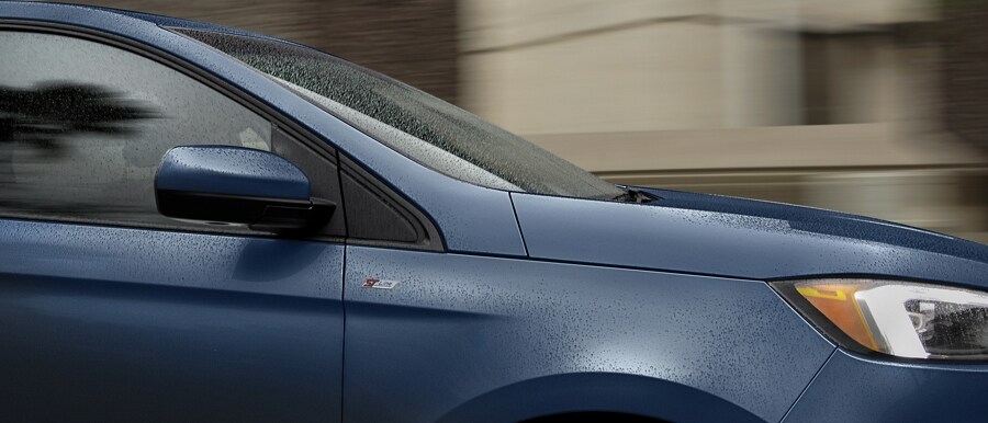Close-up of ST-Line badge on a Stone Blue 2024 Ford Edge® SUV