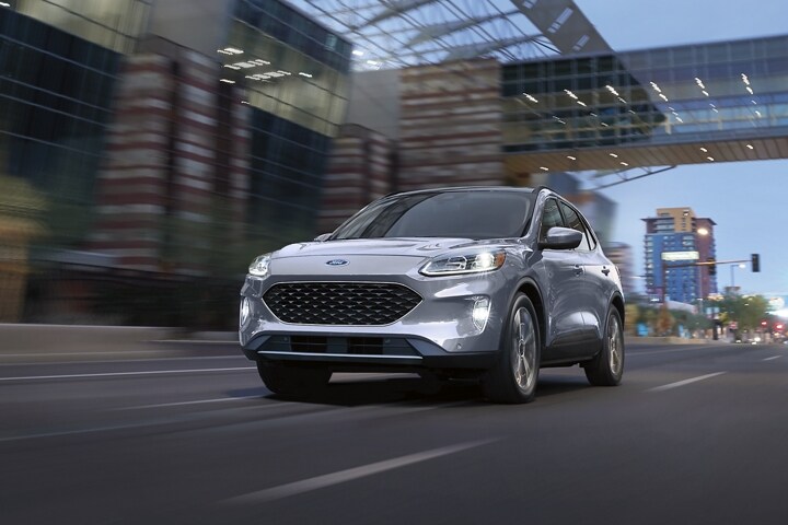 2022 Ford Escape Titanium Hybrid in Iced Blue Silver Metallic with distinctive black mesh grille