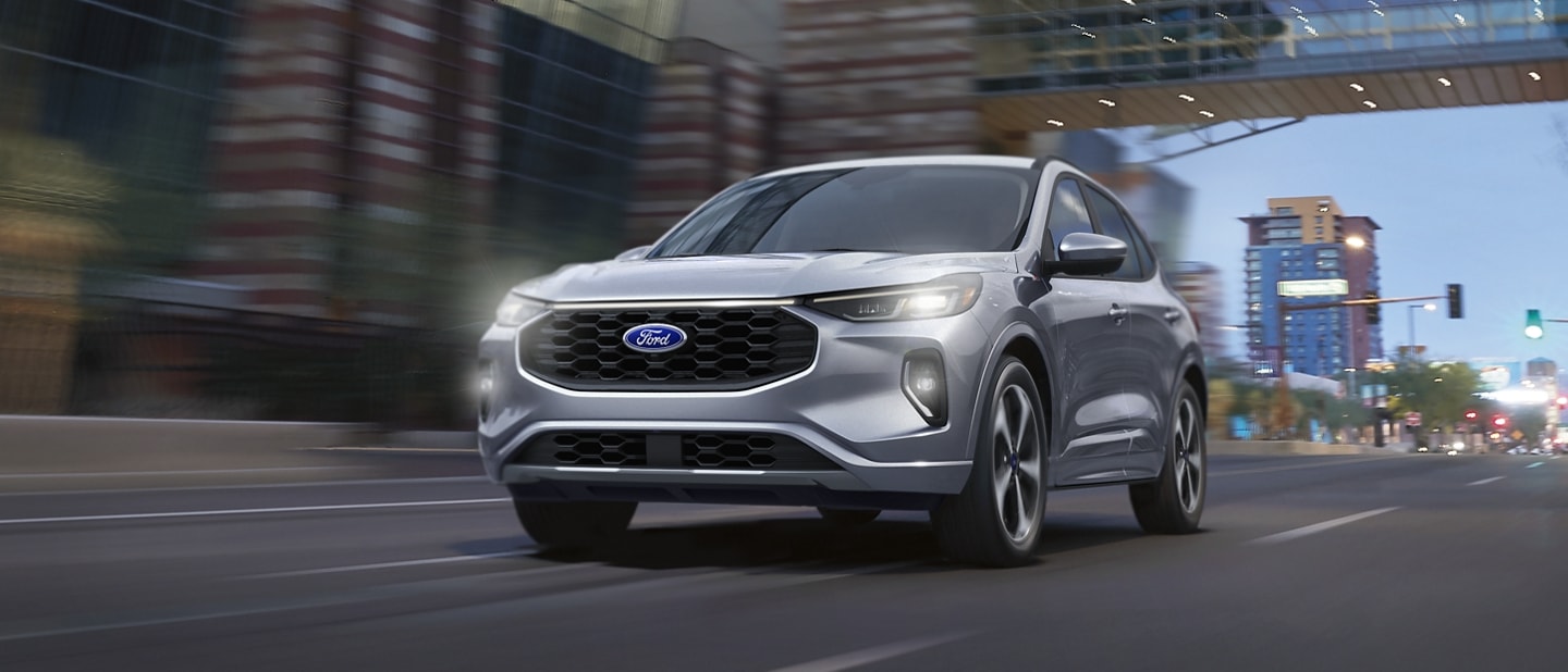 2023 Ford Escape® ST-Line Elite being driven around a city road