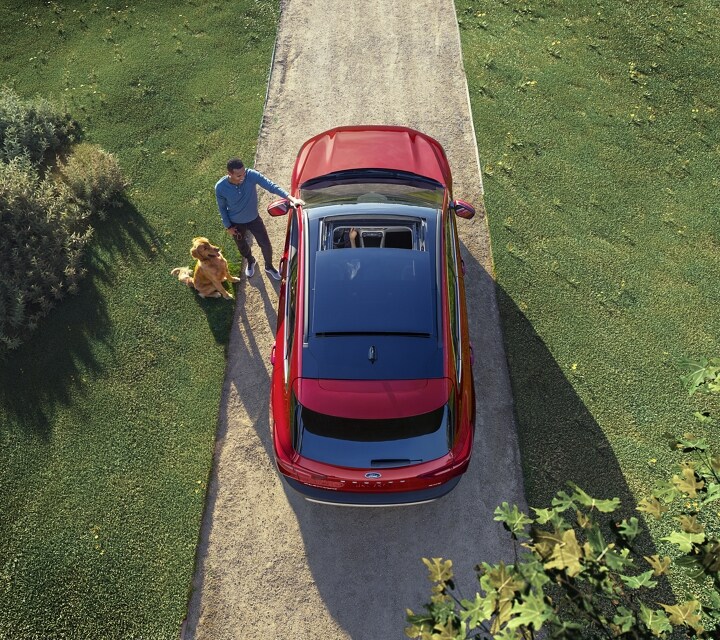 Overhead view of a red 2024 Ford Escape® parked on country road