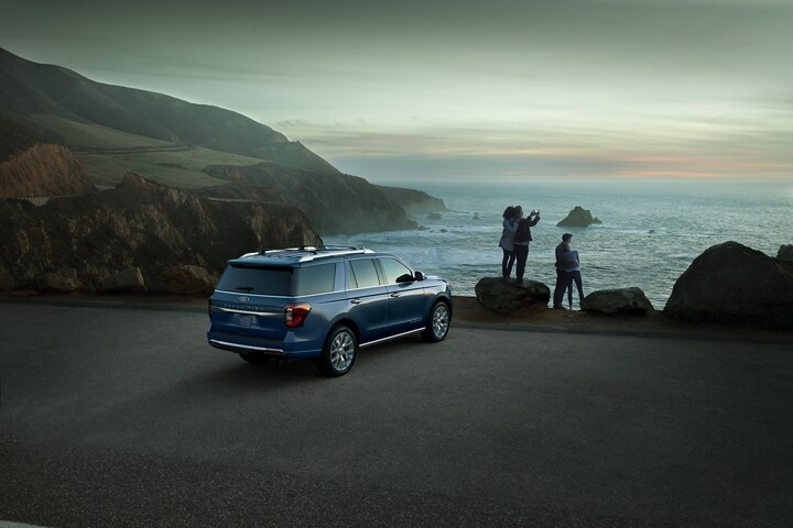 A 2023 Ford Expedition SUV parked next to a body of water