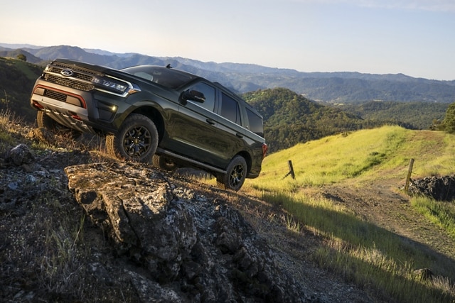 A 2023 Ford Expedition SUV being driven up a mountain