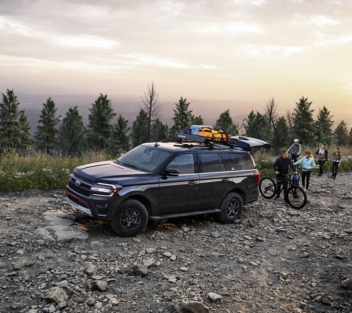 A 2023 Ford Expedition SUV being parked on a rocky road