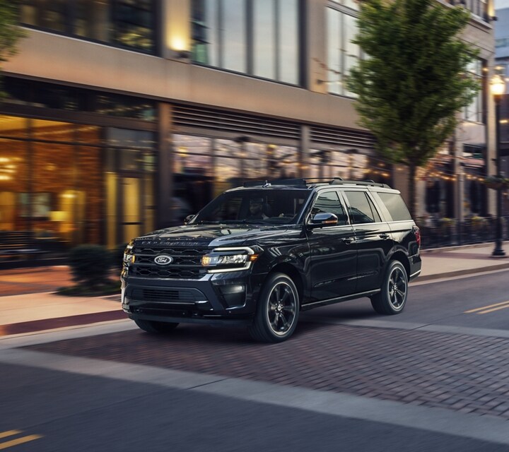 A 2023 Ford Expedition SUV being driven down an urban road