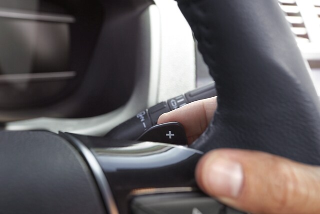 Driver using paddle shifters in a 2023 Ford Explorer® SUV
