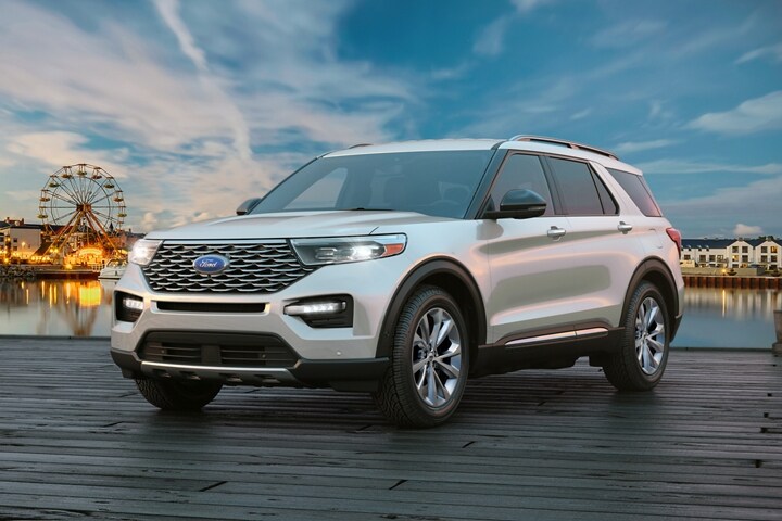 2023 Ford Explorer® Platinum model in Star White Metallic Tri-coat (extra cost colour option) on a pier