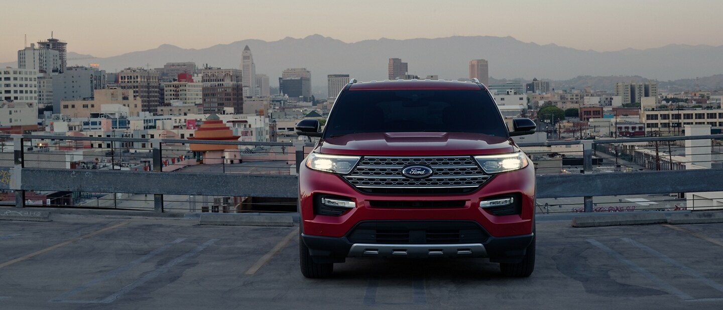 2023 Ford Explorer® Hybrid SUV parked on a parking structure at dusk