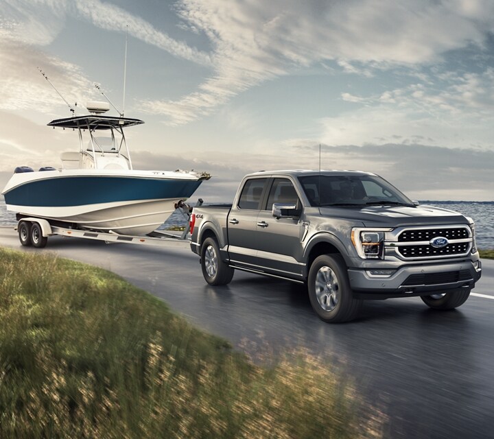 A 2021 Ford F 1 50 Platinum with a boat in tow