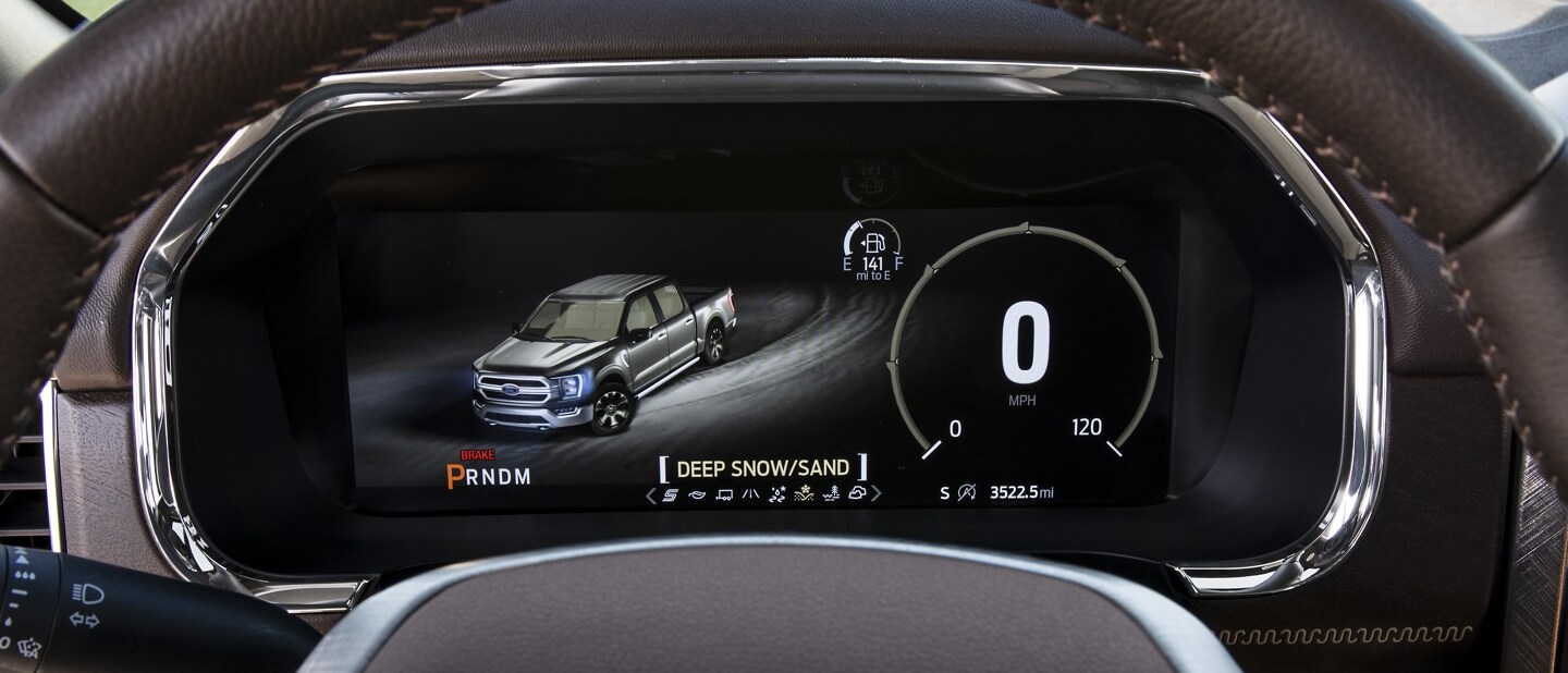 A close up of the 2021 Ford F 1 50 12 inch productivity screen displaying Deep snow and sand mode