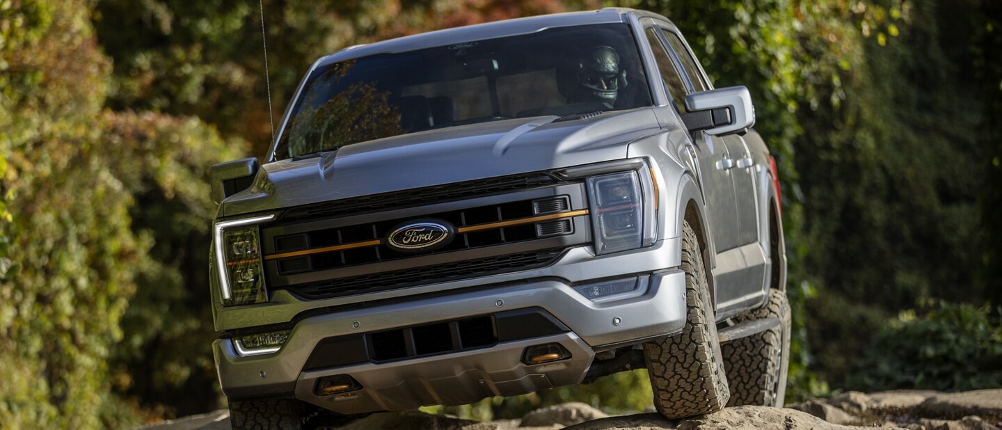 2023 Ford F-150® Tremor® driving over rocky terrain