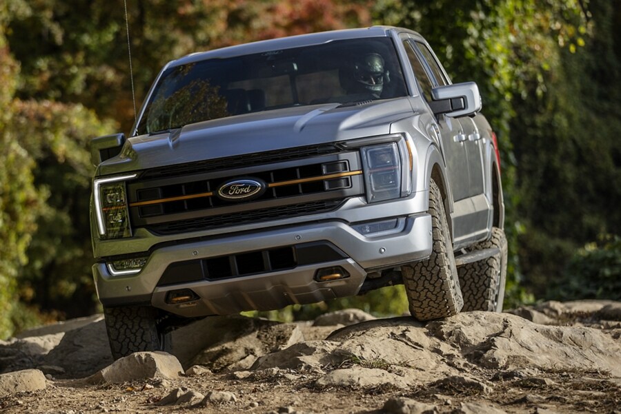 2023 Ford F-150® Tremor® driving over rocky terrain