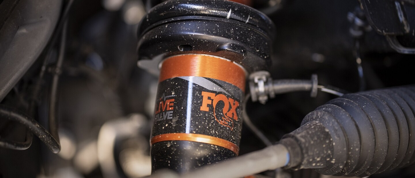 Close-up of the live valve Fox Racing Shox™ on a 2023 Ford F-150® Raptor®
