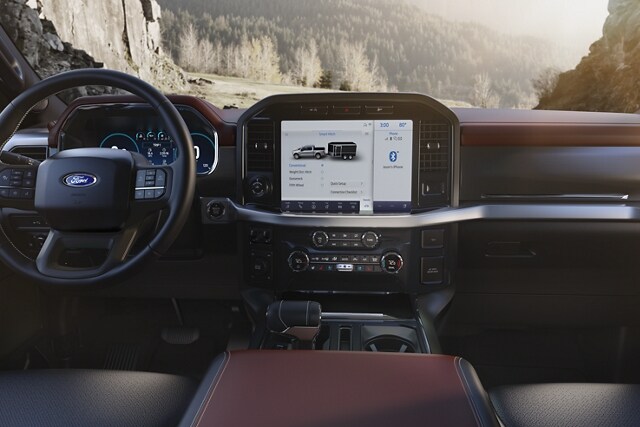 A 2023 Ford F-150® interior close-up with Smart Hitch technology on the centre touchscreen