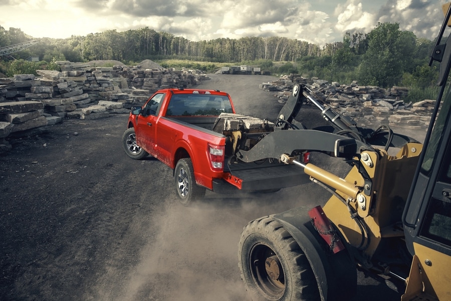A 2023 Ford F-150® being loaded with stone