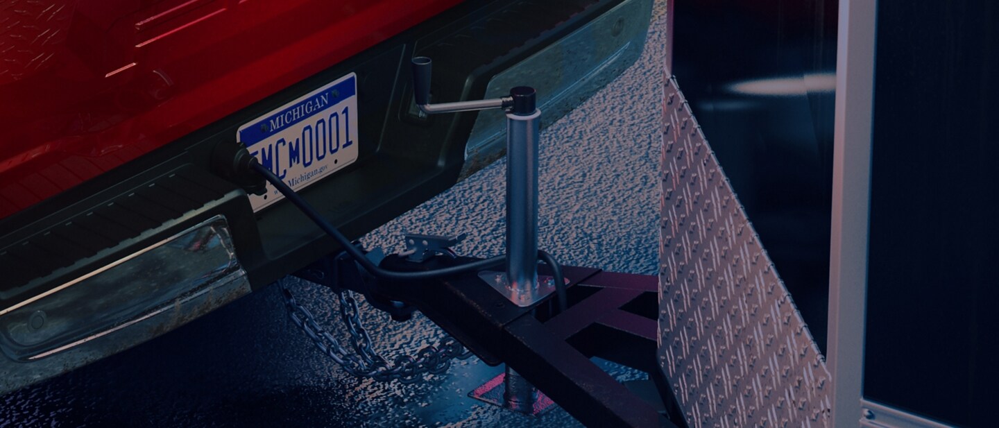 Close-up of a 2023 Ford F-150® hitched to a trailer