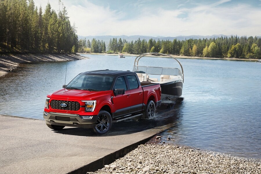 2023 Ford F-150® Heritage Edition pickup pulling a boat out of the water