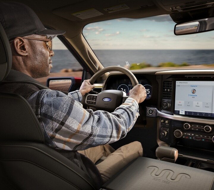 Interior of a 2024 Ford F-150® King Ranch® pickup showcasing the 12-inch LCD touchscreen display