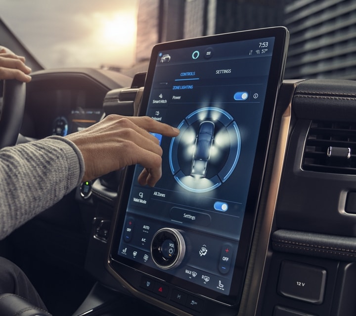 Close-up of driver operating the 15.5" touchscreen on 2023 Ford F-150® Lightning®