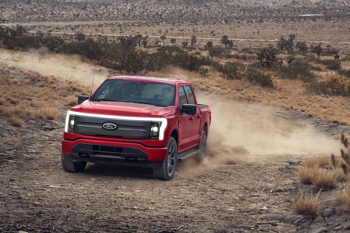 2023 Ford F-150® Lightning® being driven on a desert road