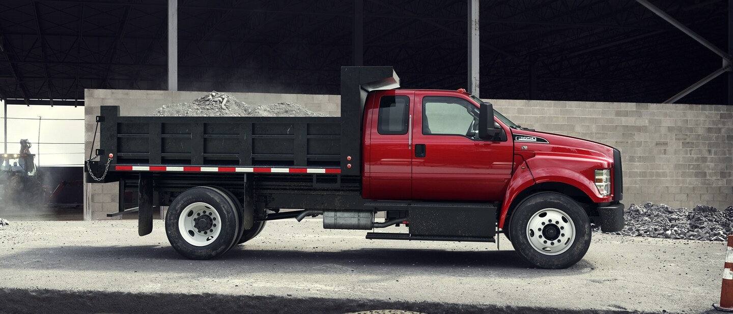 2023 Ford F-650 SuperCab shown in Race Red with dump truck upfit