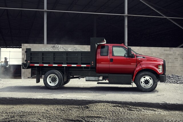 2023 Ford F-650 SuperCab shown in Race Red with dump truck upfit
