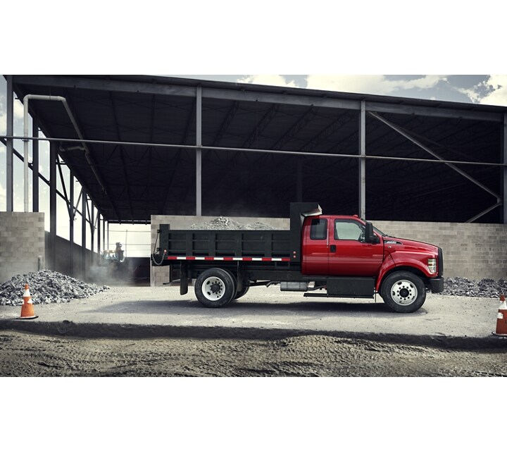 2023 Ford F-650 SuperCab in Race Red with dump truck upfit