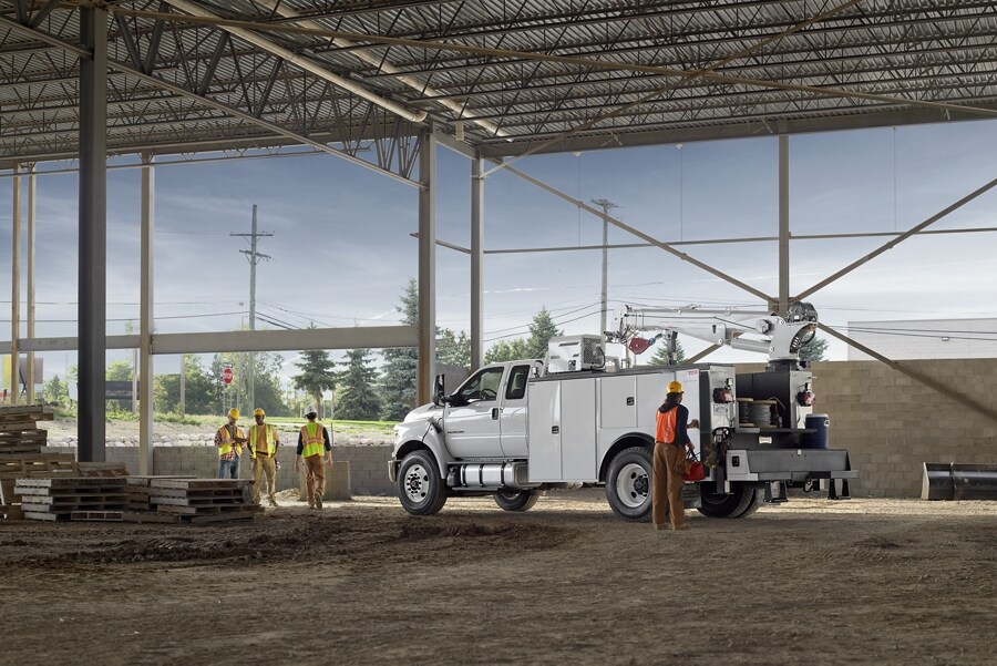 2023 Ford F-750 SuperCab in Oxford White with mechanic truck upfit at worksite