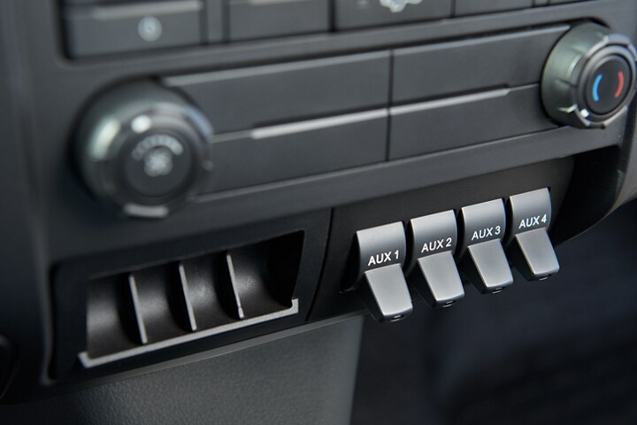 Four available factory-installed upfitter switches on 2024 Ford F-750 Regular Cab interior