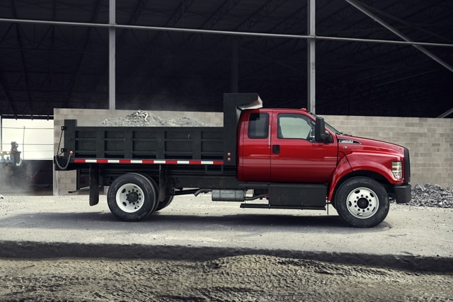 2026 Ford F-650® SuperCab shown in Race Red with dump truck upfit