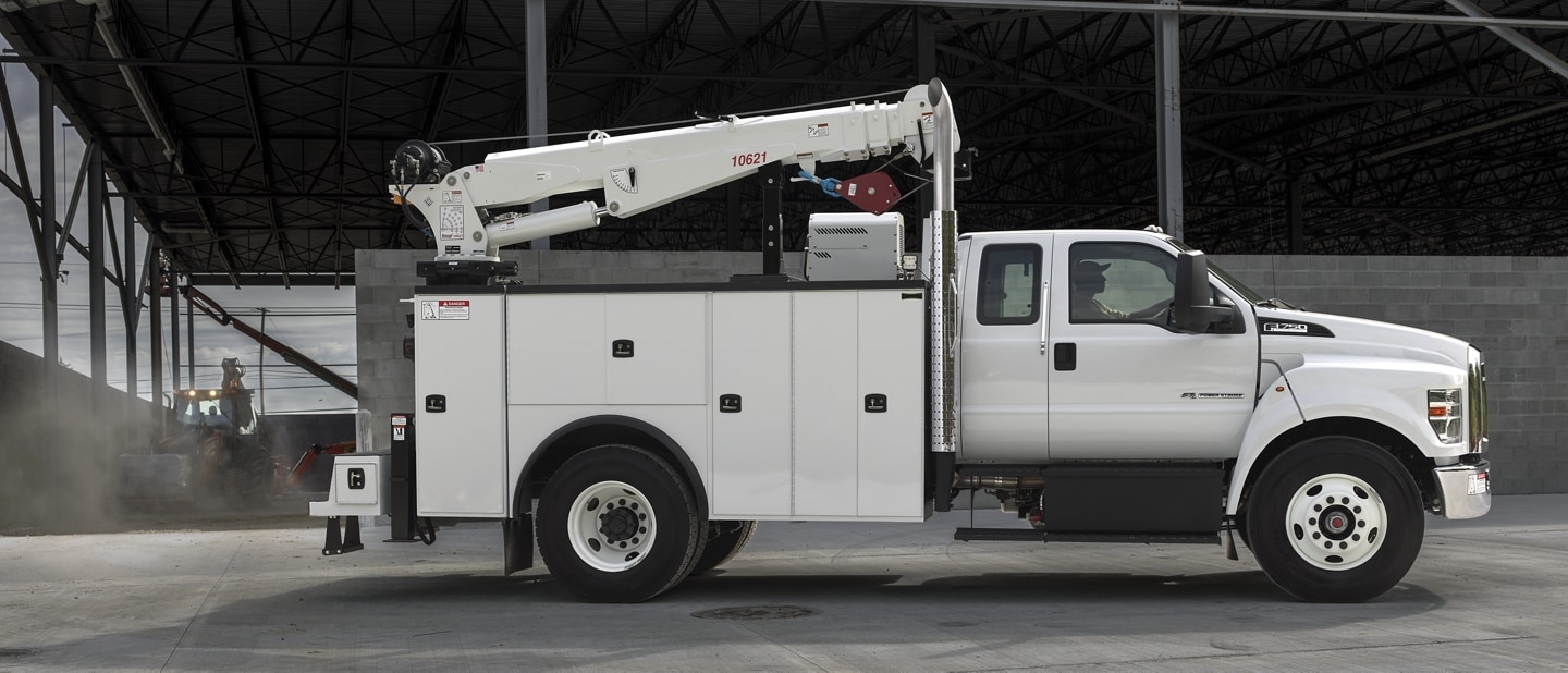 2026 Ford F-750® SuperCab in Oxford White with mechanic truck upfit parked at building site