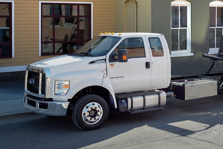 2026 Ford F-650® SuperCab with rollback body flatbed and tow truck in Oxford White