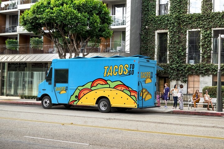 2024 Ford F-59 Stripped Chassis with food truck upfit parked beside a curb