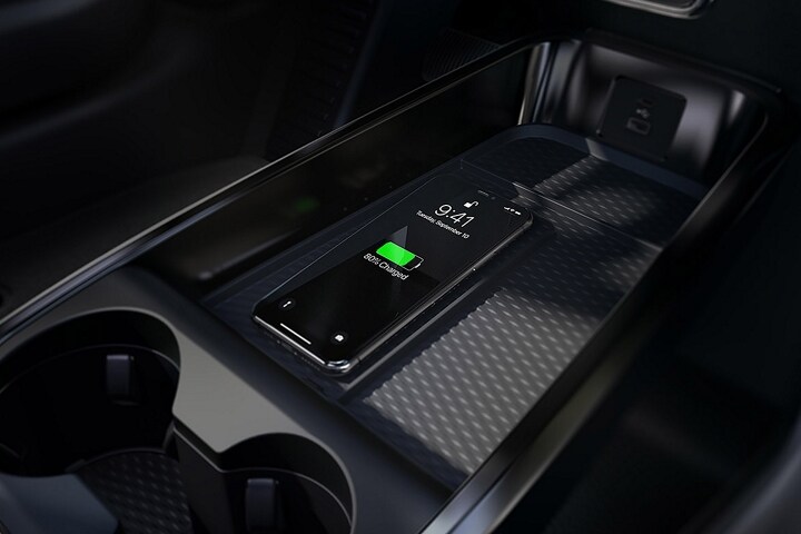 Phone being charged via Wireless Charging in the console of a 2023 Ford Mustang Mach-E®
