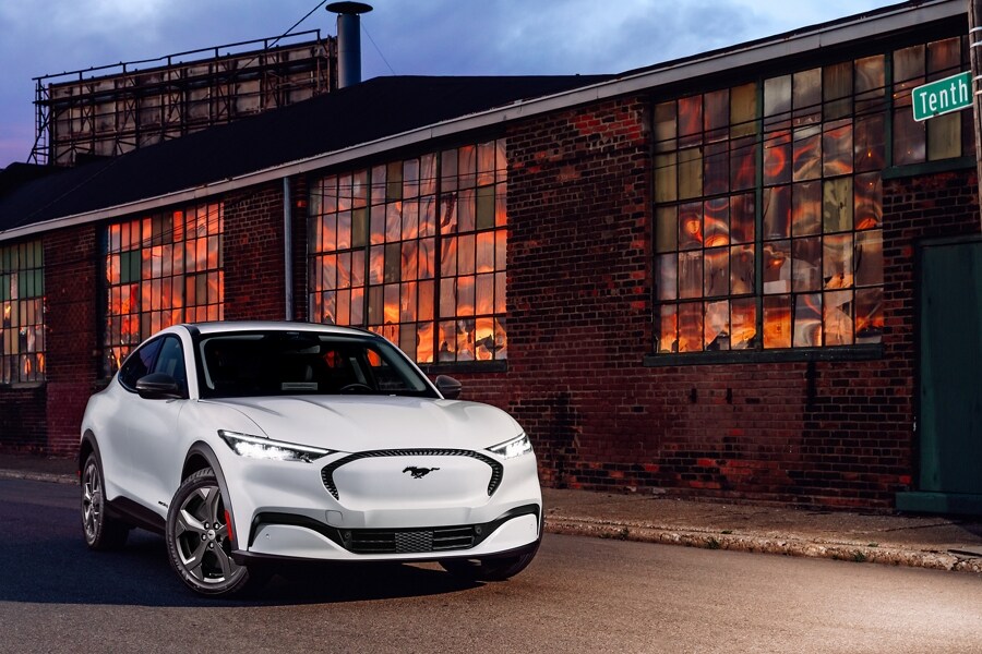 2023 Ford Mustang Mach-E® Select parked in front of a brick building