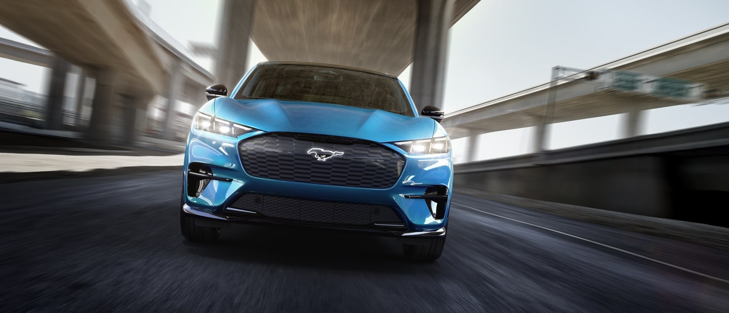 2024 Ford Mustang Mach-E® being driven down on the highway