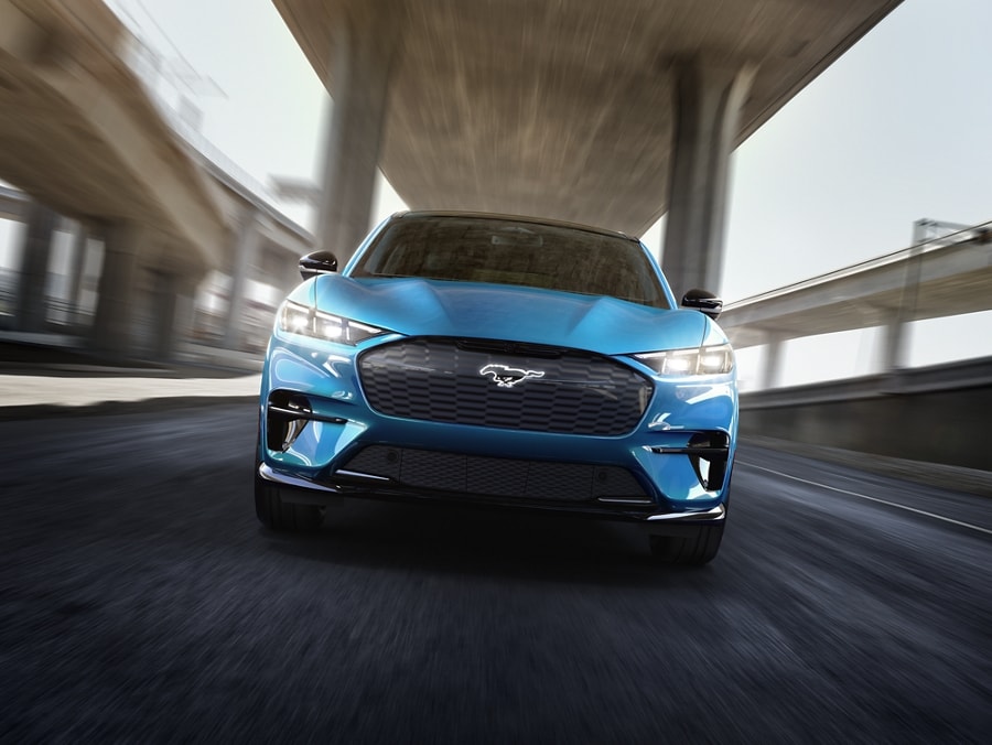 2024 Ford Mustang Mach-E® being driven down on the highway