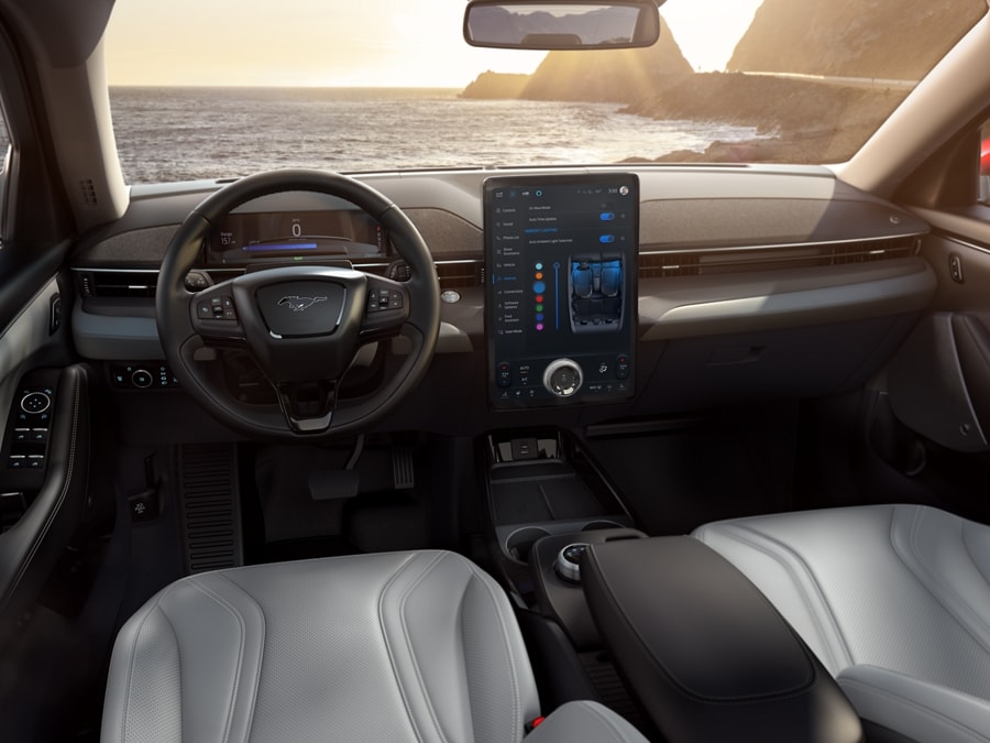 2024 Ford Mustang Mach-E® interior with steering wheel and centre touchscreen showing