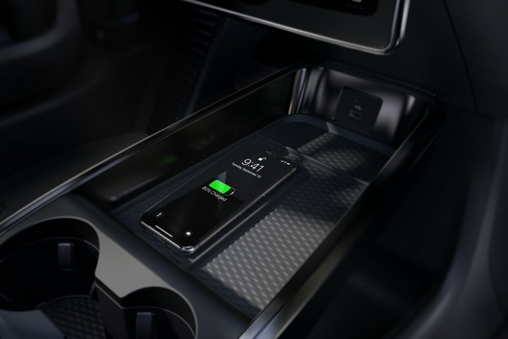 Phone charging inside the vehicle on the wireless charging pad