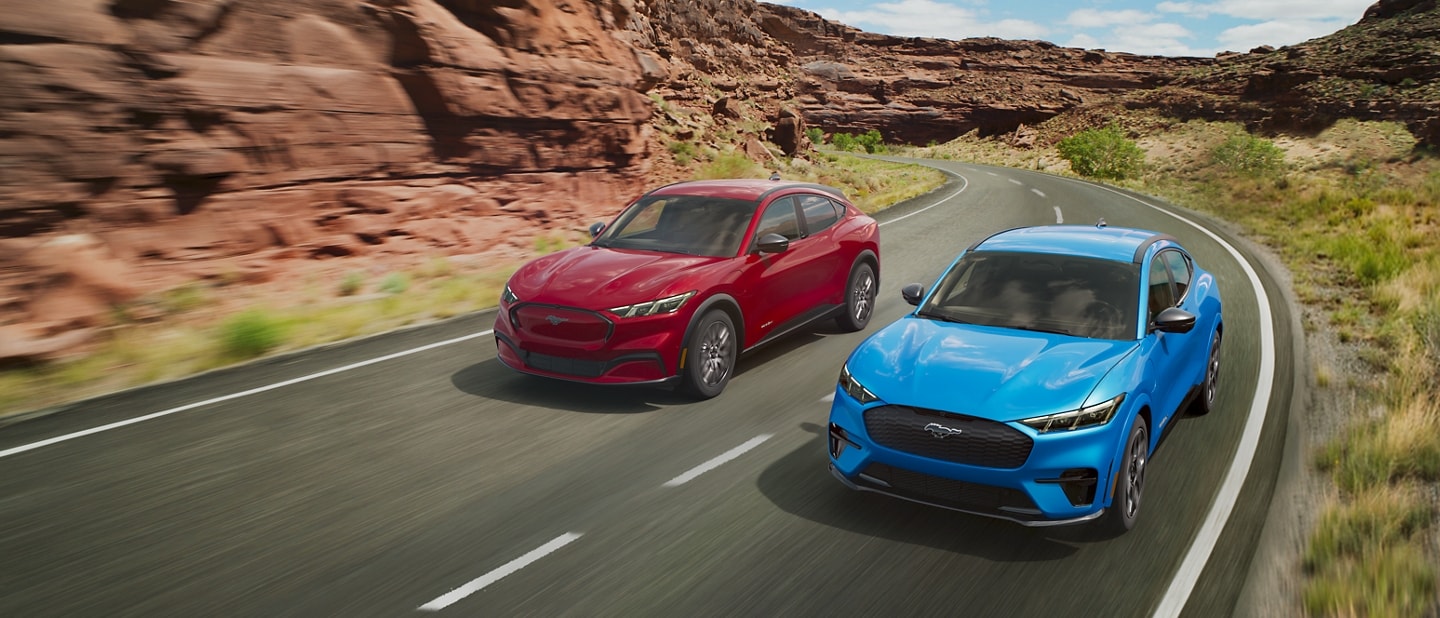 Two 2024 Ford Mustang Mach-E® SUVs on a desert route