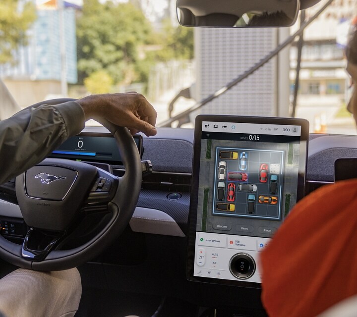 2024 Ford Mustang Mach-E® with the centre console touchscreen being watched