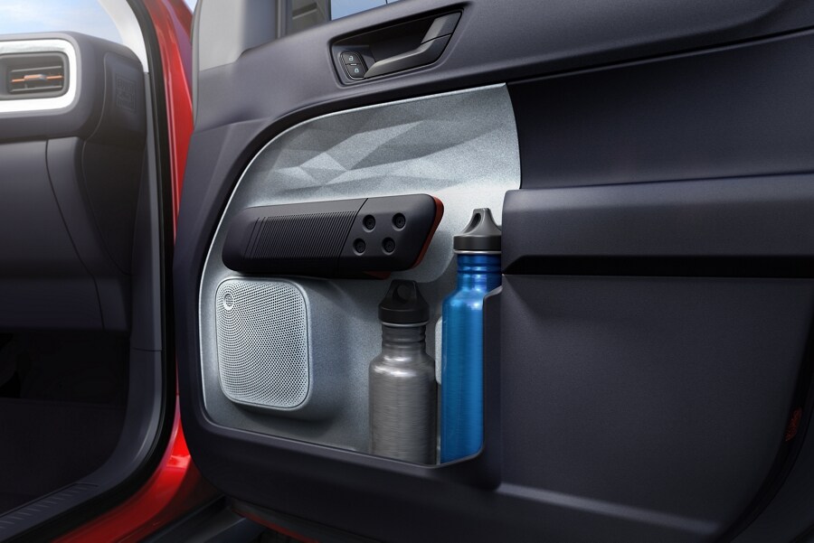 Two bottles in the Door-Pocket Storage of the 2023 Ford Maverick® truck